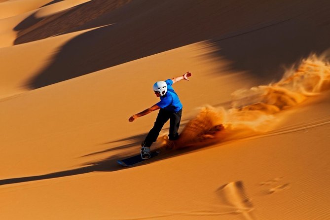 Desert Safari Dubai at Evening with BBQ Dinner - Camel rides, Arabic coffee, and a traditional camp