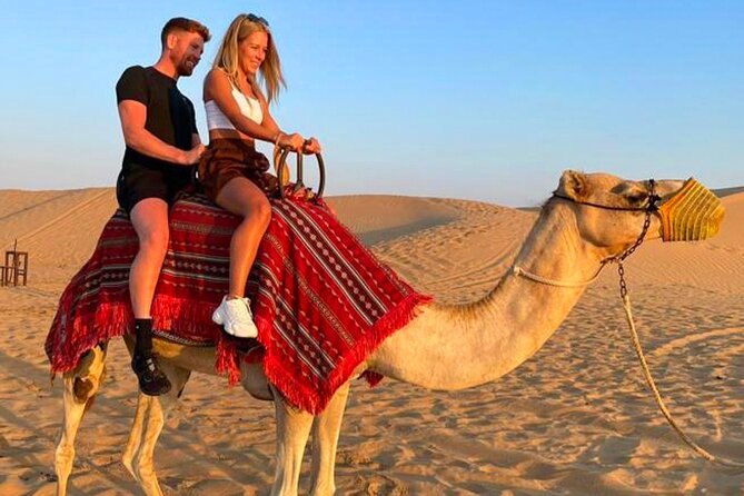 Desert Safari Dubai Tour with Dune Bashing, Camel Ride, & BBQ - From Dubai hotels to the Lahbab dunes