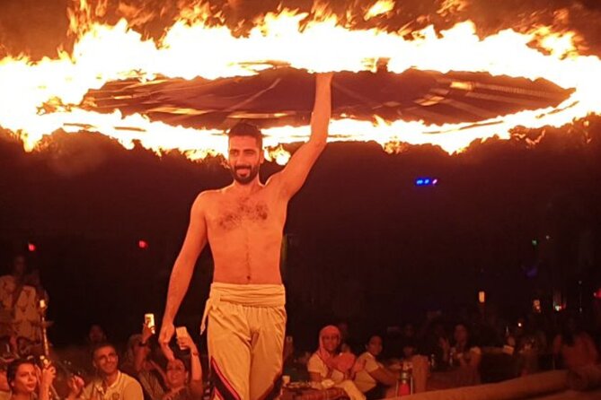 Desert Safari Dubai Tour with Dune Bashing, Camel Ride, & BBQ - Belly dancing, Tanoura, and the fire show