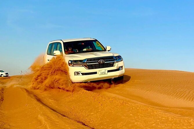 Desert Safari Dubai with BBQ Dinner & Camel Ride - From Dubai pickup to the Lahbab dunes