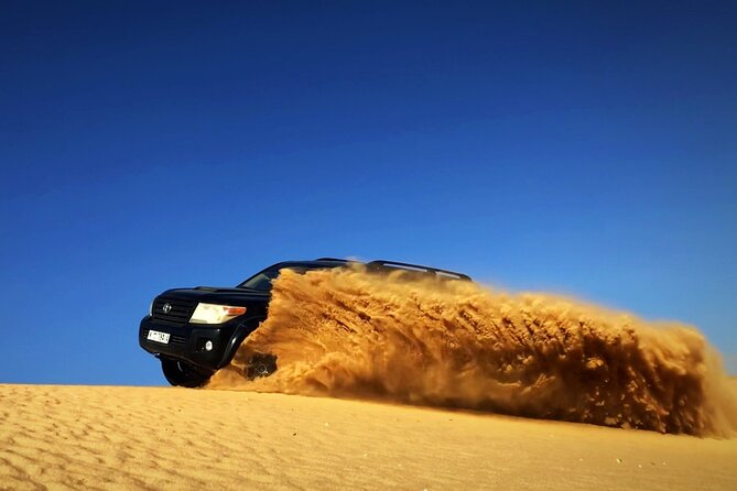 Desert Safari Dubai with BBQ - dinner, Sandboarding - Leaving Dubai in a small Land Cruiser group