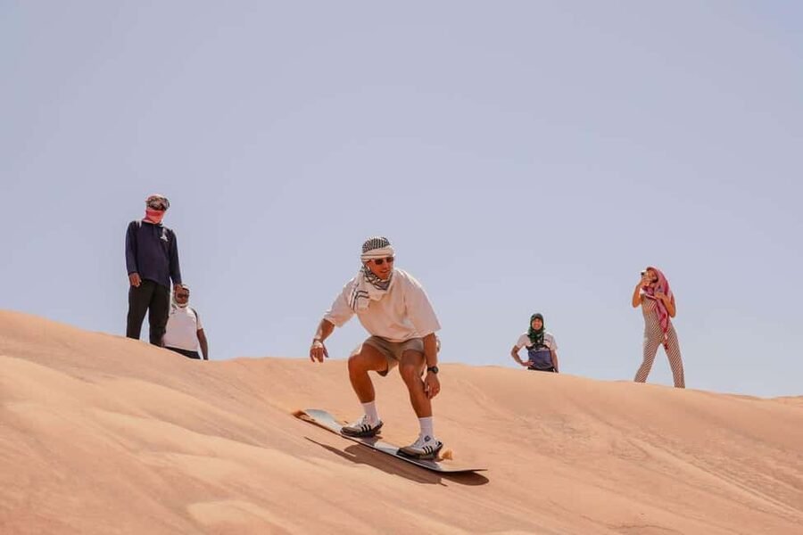Desert Safari Dubai with Camel Ride, Sandboarding & Dinner - From Dubai streets to the Lahbab dunes