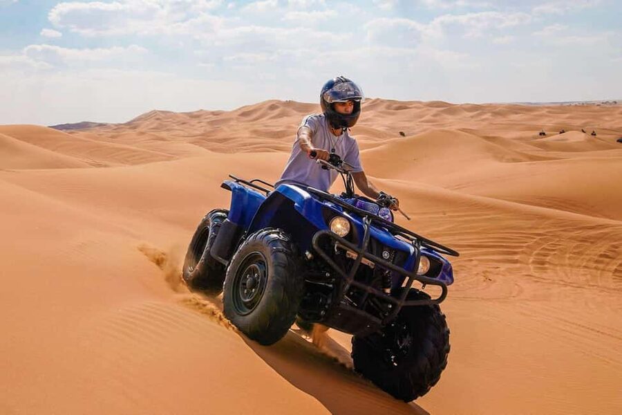 Desert Safari Dubai with Camel Ride, Sandboarding & Dinner - Quad biking at Lahbab
