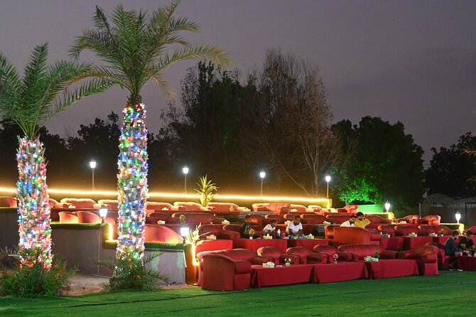 Desert Safari Dubai with Dune Bashing, Activities and Dinner - Sunset, Arabic clothing, and the camp setting