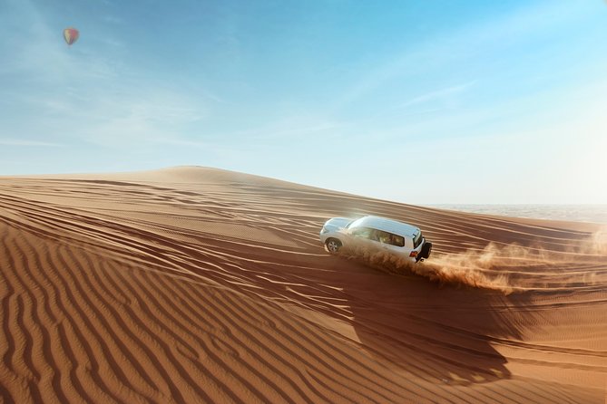 Desert Safari Dubai with Dune Bashing, Sandboarding, Camel Ride, 5 Shows, Dinner - A Six-Hour Evening in Al Awir