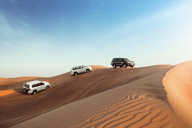Desert Safari Dubai with Dune Bashing, Sandboarding, Camel Ride, 5 Shows, Dinner - The 4x4 Ride Across the Golden Sand