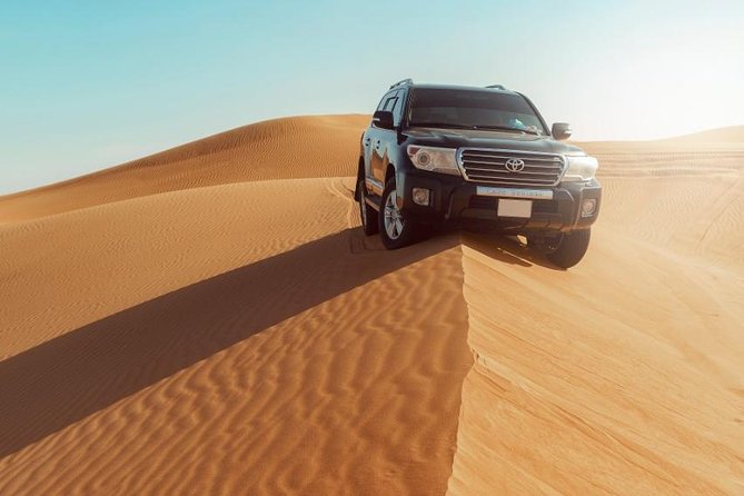 Desert Safari Dubai with Dune Bashing, Sandboarding, Camel Ride, 5 Shows, Dinner - BBQ Dinner and Four Listed Live Shows
