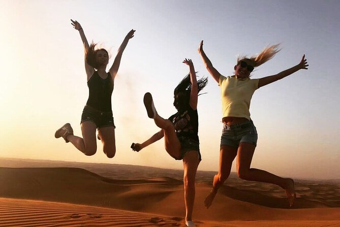 Desert Safari in 4x4 Car with BBQ Dinner and Belly Dance - Camel riding and sandboarding at camp