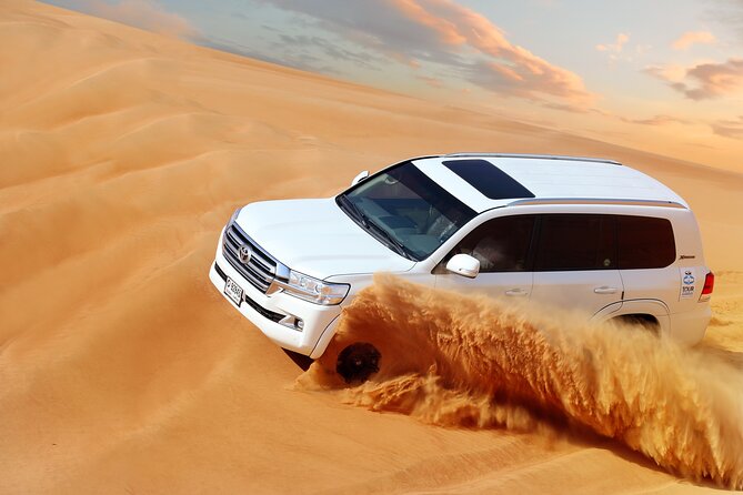 Desert Safari: Luxury Fortress Dinner, Camel Ride & Dune Bashing - Entering Al Sahra Desert Fortress after sunset
