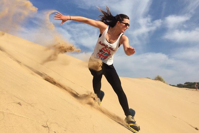 Desert Safari Morning with Camel Ride and Sand Boarding - Optional quad biking for a more active morning