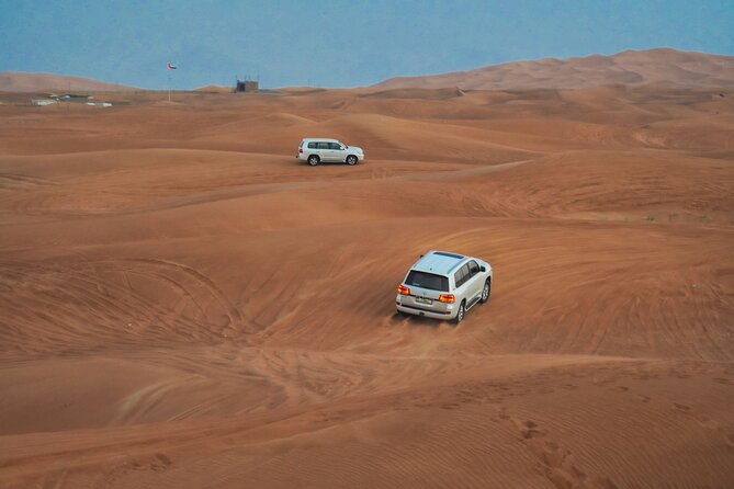 Desert Safari, Open Desert Quad Bike Experience with BBQ Dinner - Sandboarding and a short camel ride