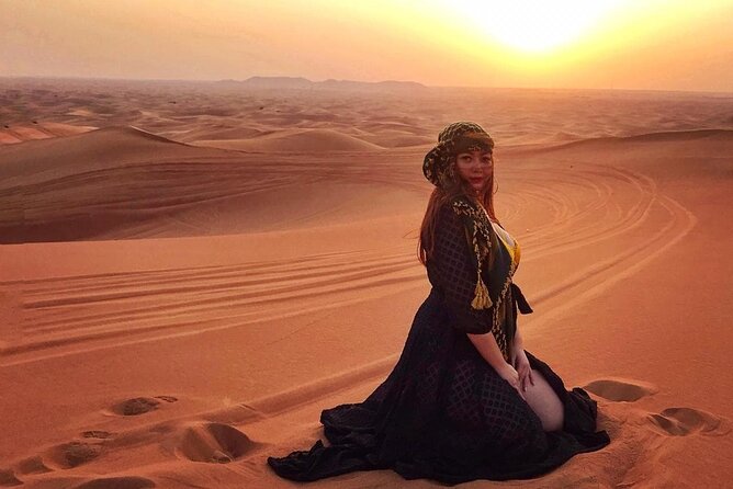 Desert Safari Quad Bike Activity with Dinner in Dubai - Sunset photography on the red sand