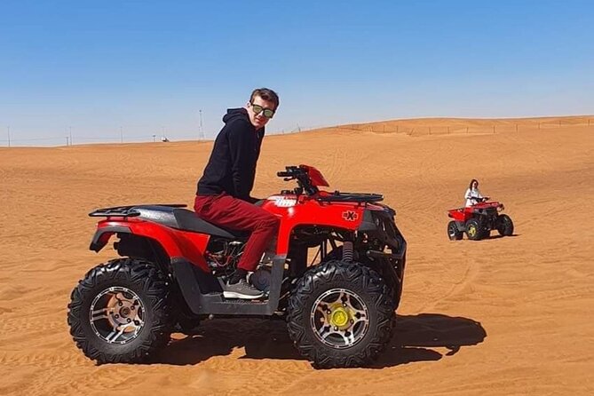 Desert Safari Quad Bike Activity with Dinner in Dubai - Camp arrival, tea, coffee, and simple desert customs