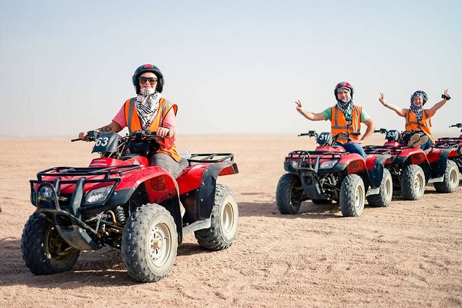 Desert Safari, Quad Biking, Sand Surfing and BBQ Dinner In Dubai - Camel photos, henna, and the desert camp