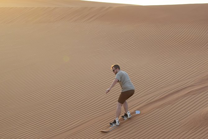 Desert Safari Tour, Quad Bike with BBQ Dinner & Show from Dubai - Tanoura, belly dance, and fire performances