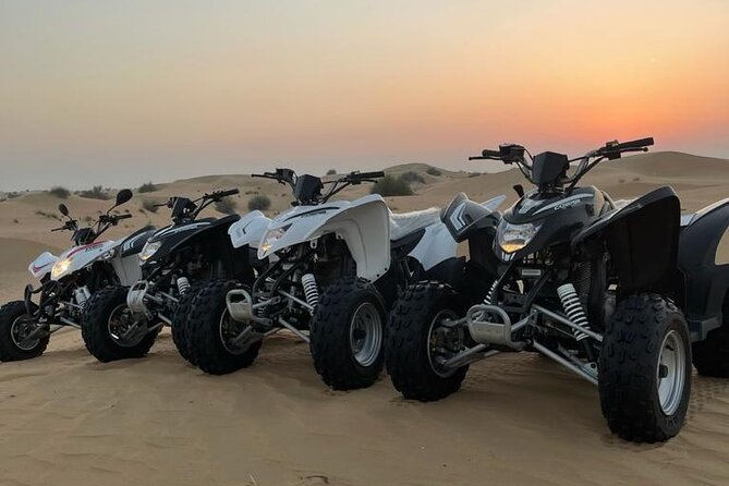 Desert Safari W/BBQ Dinner, Quad Bike, Camel Ride, & Sandboarding - Leaving Dubai for the red dunes