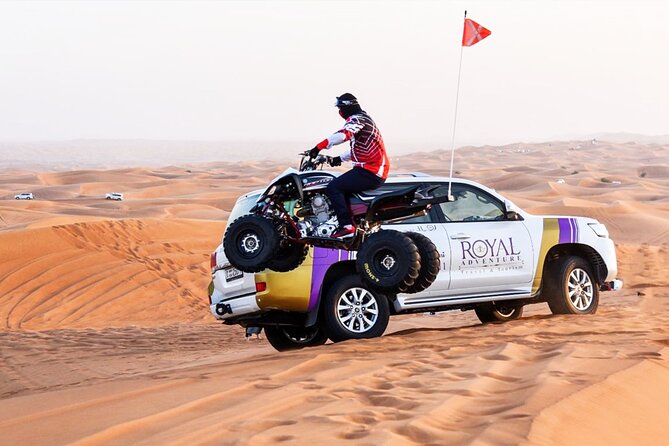 Desert Safari W/BBQ Dinner, Quad Bike, Camel Ride, & Sandboarding - Quad biking and sandboarding in the desert