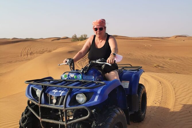 Desert Safari With 30 Mins Of Quad Bike Tour Camel Ride And BBQ - Thirty minutes of red-dune dune bashing