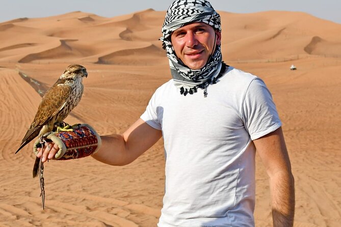 Desert Safari With 30 Mins Of Quad Bike Tour Camel Ride And BBQ - Sandboarding on the slopes