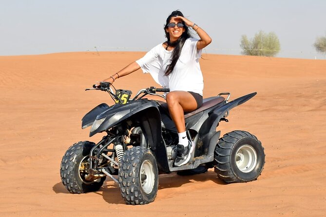 Desert Safari With 30 Mins Of Quad Bike Tour Camel Ride And BBQ - Sunset at the Bedouin-style camp