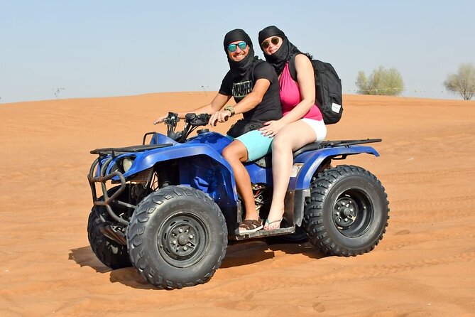 Desert Safari With 30 Mins Of Quad Bike Tour Camel Ride And BBQ - BBQ dinner and three live shows