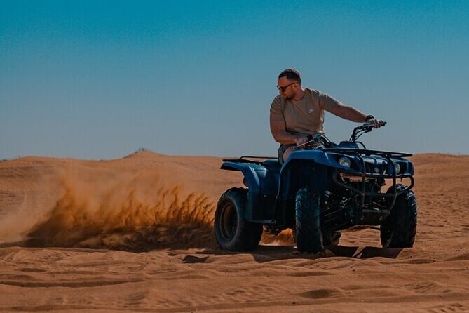 Desert Safari with 30 Minutes Quad Biking on High Red Dunes (Complete Package) - Luxury 4x4 pickup, transfer time, and the daily rhythm