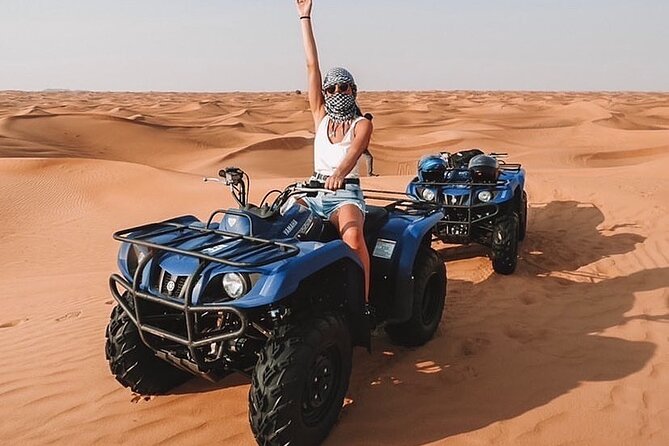 Desert Safari with 30 Minutes Quad Biking on High Red Dunes (Complete Package) - A short sunset stop on the tallest dunes