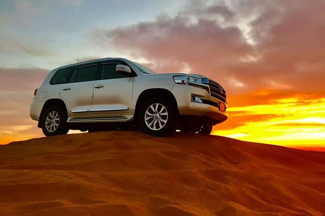 Desert Safari with BBQ Dinner, Camel Ride, Sand Board & Live Show - Key points at a glance