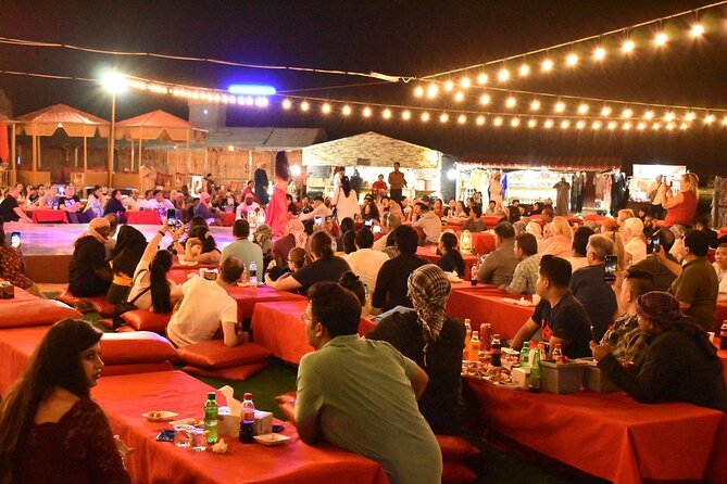 Desert Safari with BBQ Dinner from Dubai - Camel riding and soft-sand sandboarding