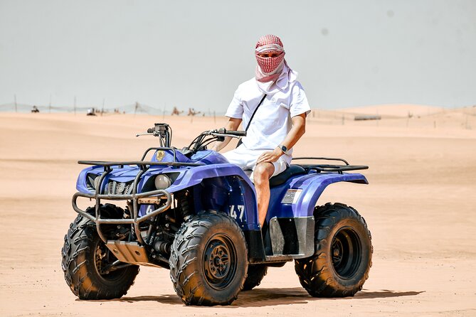 Desert Safari With BBQ Dinner, Quad Bike & Camel Ride from Dubai - Dune bashing across Lahbab