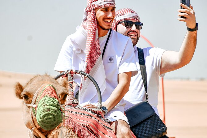 Desert Safari With BBQ Dinner, Quad Bike & Camel Ride from Dubai - Quad bikes, sandboarding, and camel time