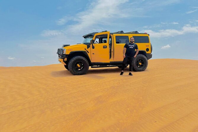 Desert Safari with Dune bashing BBQ Dinner and More Activities - Belly dance, fire, and Tanoura after dark