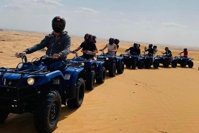 Desert Safari with Quad Bike Ride in Red Dunes - Red dunes, quad bikes, and the shape of the day