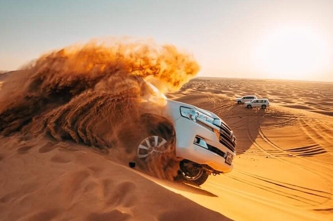 Desert Tour by ATV OR Buggy Self-drive, BBQ Dinner and Camel Ride - From Dubai to the red dunes of Lahbab