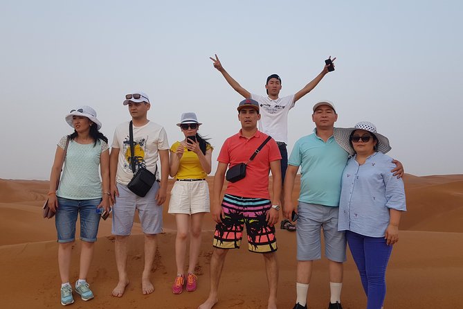 Dubai 4x4 Desert Safari, Quad Bike, Camel Ride & BBQ Dinner - Camel riding and the first taste of camp life