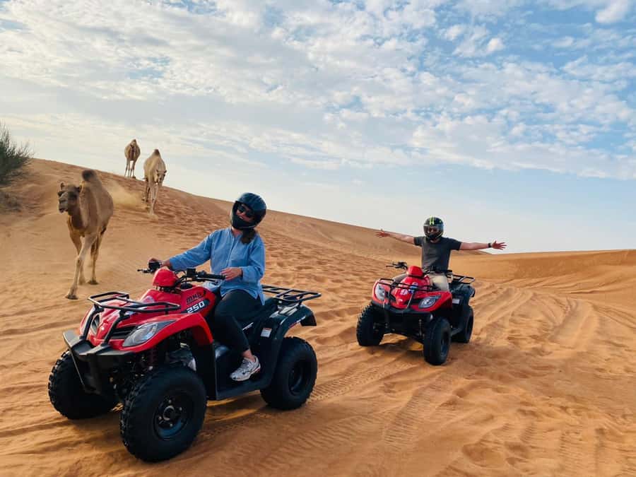 Dubai: Adventure Quad Bike Safari, Camel Ride & Refreshment - Leaving Dubai for the open desert