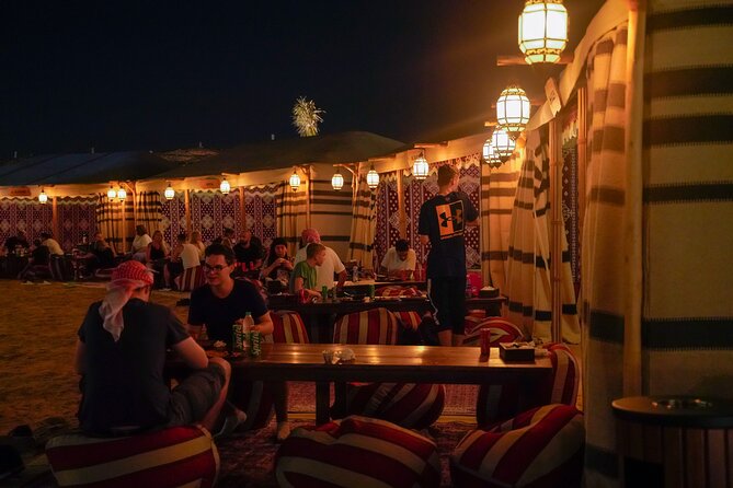 Dubai Al Khayma Camp Experience with BBQ Dinner and Transfers - Camel feeding and a short ride