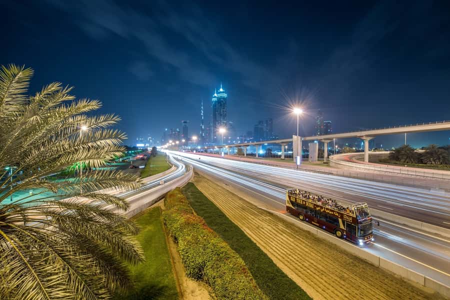 Dubai: Big Bus Panoramic Night Tour & Optional Dinner Cruise - Starting at Dubai Mall and seeing the city switch on
