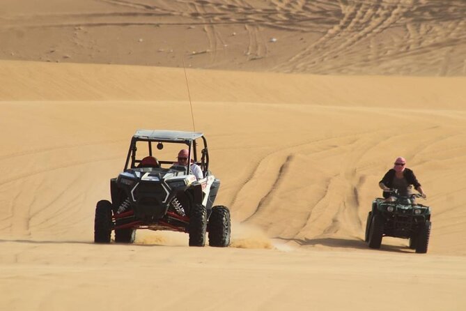 Dubai Buggy Tour in red sands and Desert Safari - Taking the wheel among the red dunes