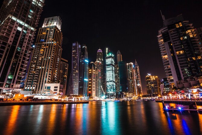 Dubai by Night City Tour - The Water Canal and Dubai Frame from the road