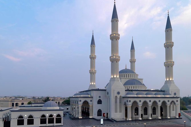 Dubai City Tour: Frame Tickets, Creek, Souks, Blue Mosque & Abra - Spice Souk and the abra across Dubai Creek