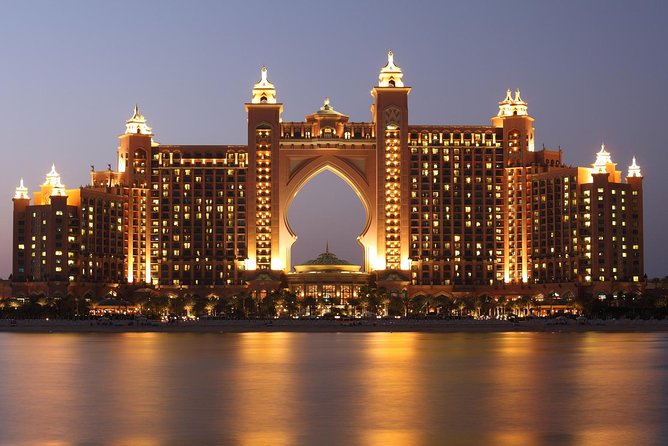 Dubai City Tour with Desert Safari, Camel Ride, Dune Bashing & BBQ - Sunset at the campsite