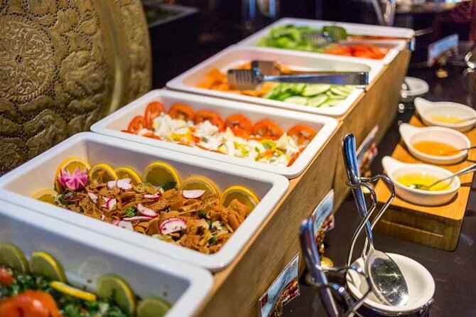 Dubai Creek Dhow Dinner Cruise - Drinks, music, and live shows