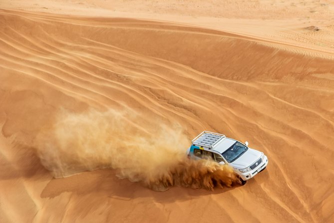 Dubai Desert 4x4 Dune Bashing, Sandboarding, Camel Riding, Dinner - Is $83.73 a Fair Price?