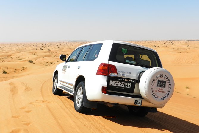 Dubai Desert BBQ Dinner, Camel Ride, Sandboarding and Live Shows - Sandboarding before the camp