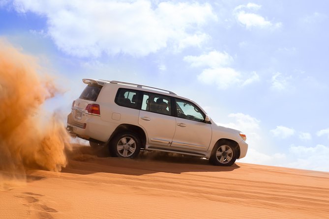 Dubai Desert Journey: Red Dunes Safari with BBQ in Bedouin Camp - Forty-five minutes of dune bashing in a 4WD
