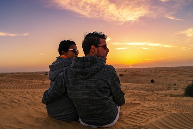 Dubai Desert Journey: Red Dunes Safari with BBQ in Bedouin Camp - Sunset, sandboarding, and the highest dune