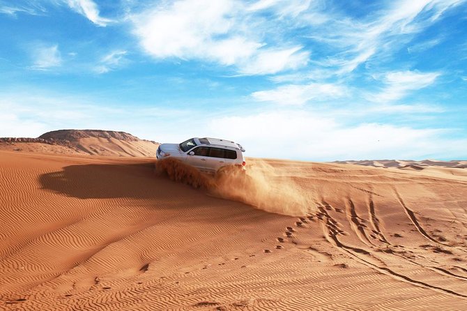 Dubai Desert Journey: Red Dunes Safari with BBQ in Bedouin Camp - The drive to Lahbab and the 20-minute preparation stop