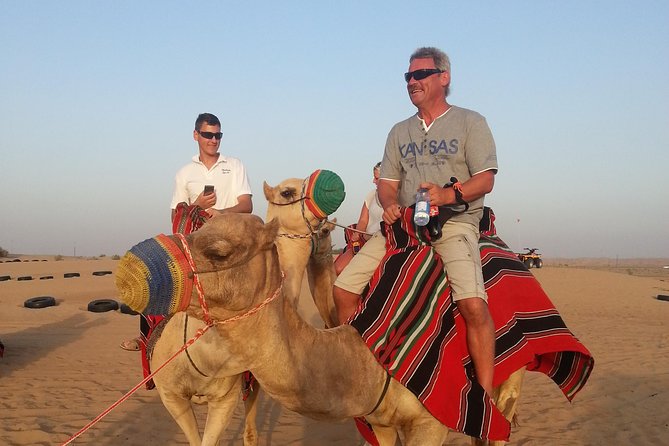 Dubai Desert Morning Tour in 4WD Vehicle: Camel Ride, Quad Bike Tour, Sandboarding, and Camel Farm - A Short Camel Ride With a Rolling Gait