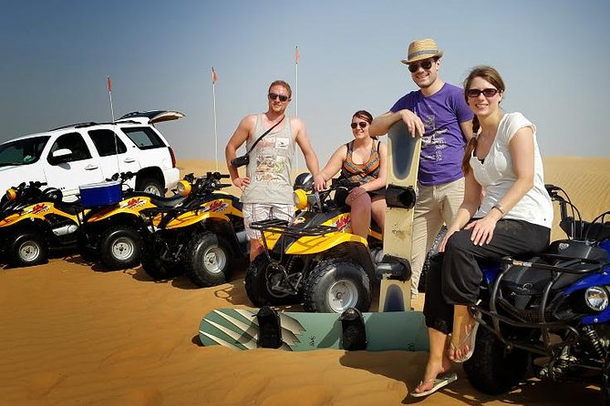 Dubai Desert Morning Tour in 4WD Vehicle: Camel Ride, Quad Bike Tour, Sandboarding, and Camel Farm - Sandboarding Down the Dunes